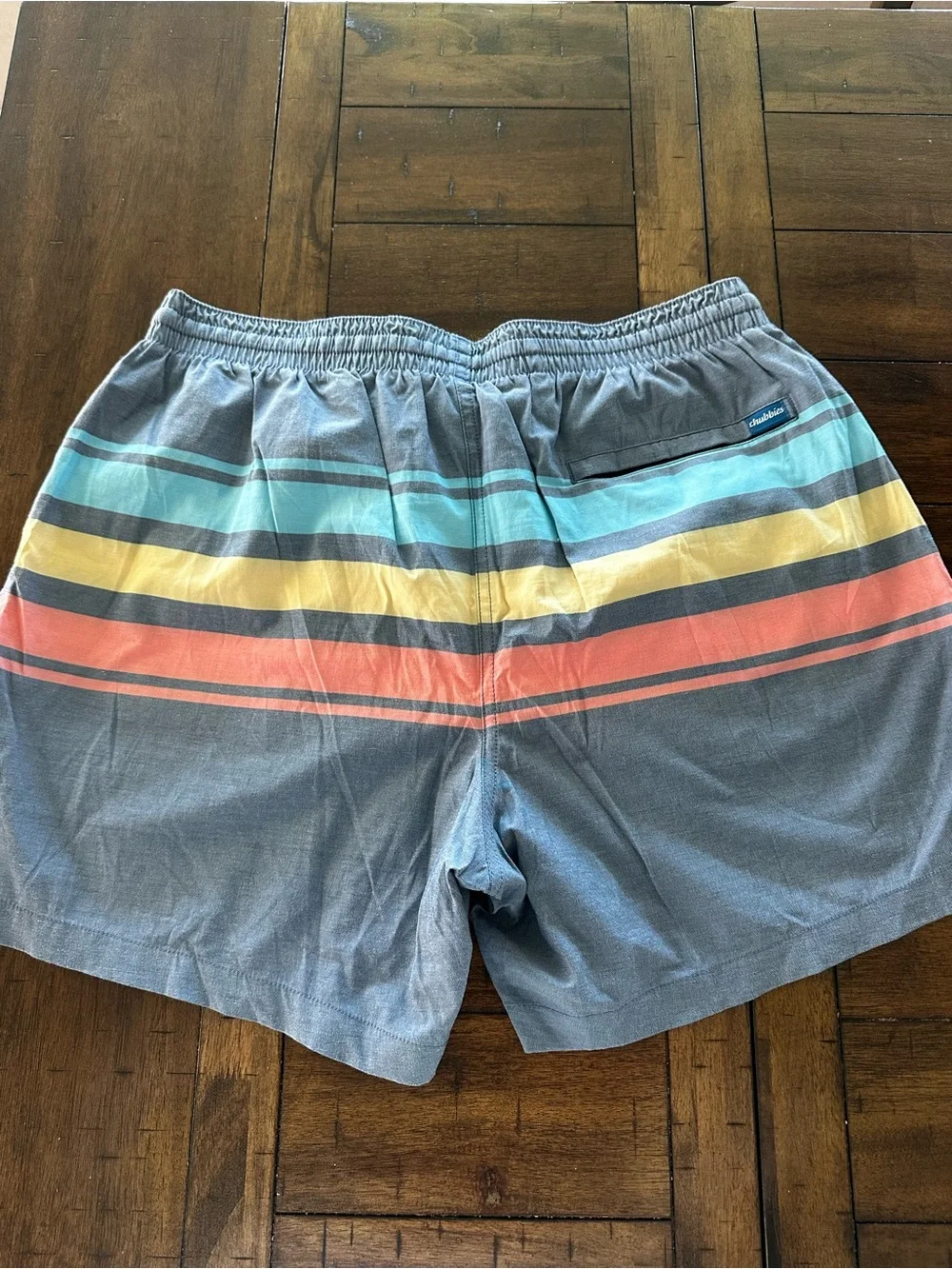 chubbies Blue Swim Trunks with Aqua Yellow and Coral Stripes 5.5”